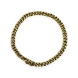 A gold curb link bracelet,