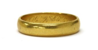 A gold wedding ring,