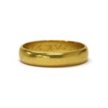 A gold wedding ring,