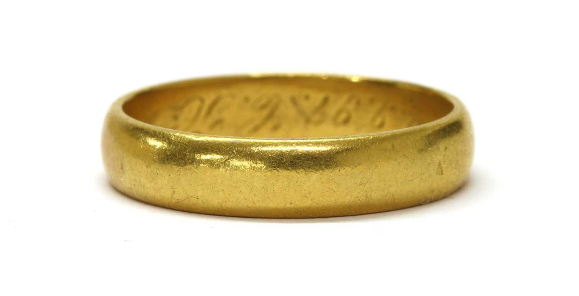 A gold wedding ring,