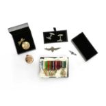 A 9ct gold circular Royal Naval Air Service (RNAS) locket,