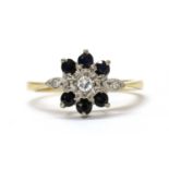 An 18ct gold sapphire and diamond cluster ring,