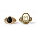 A gold diamond and resin set initial 'M' ring,