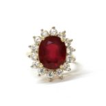 A 9ct gold fracture filled ruby and zircon cluster ring,