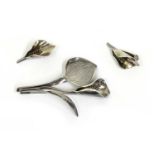 A Danish silver calla lily brooch and earrings suite, by Anton Michelsen,