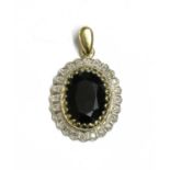 A 9ct gold sapphire diamond pendant,