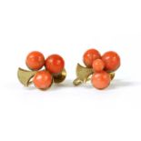 A pair of gold coral bouton trefoil earrings,
