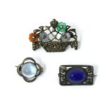 Three silver brooches,