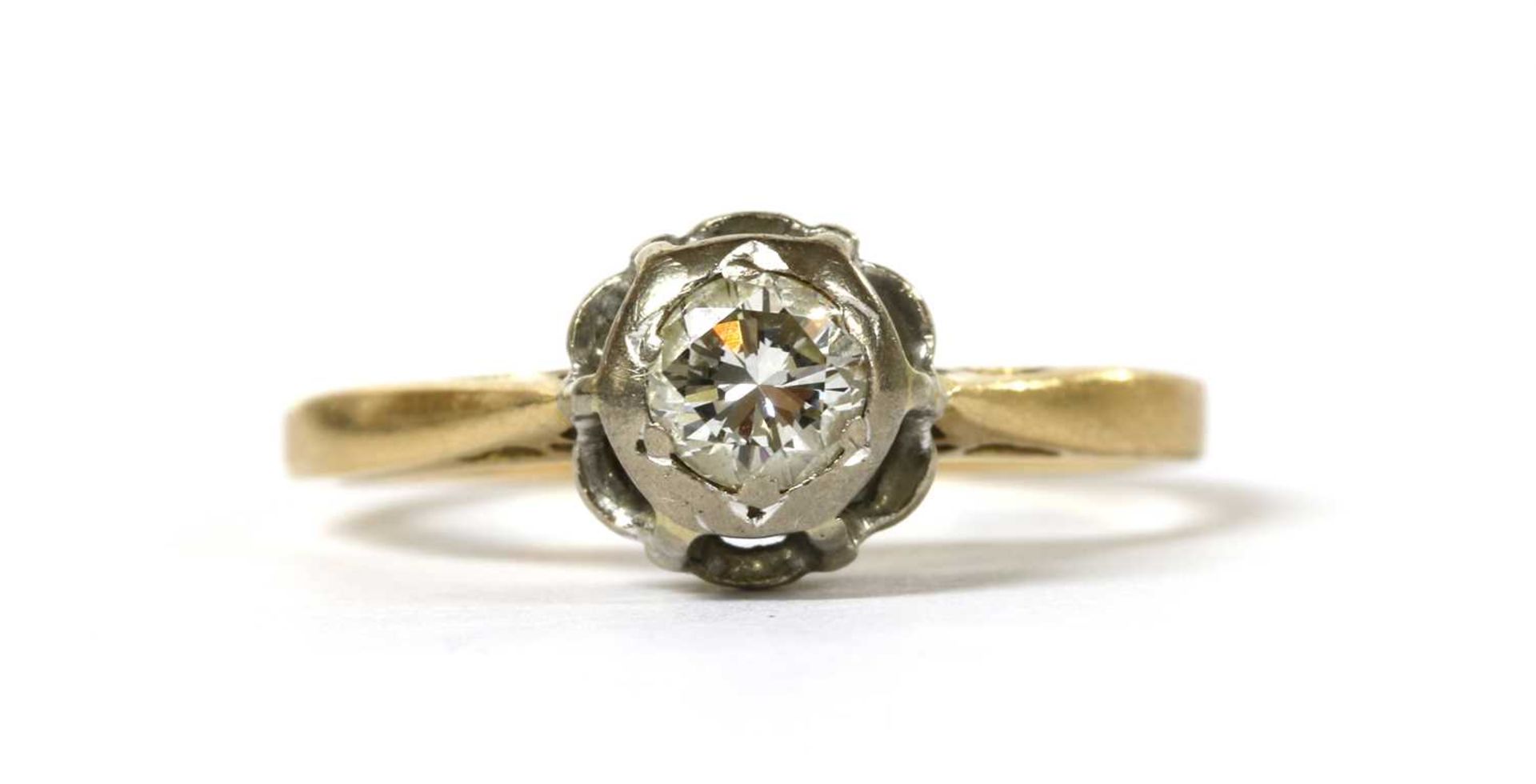 A gold single stone diamond ring,