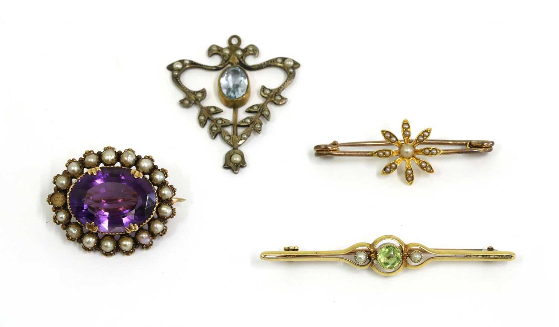 Three gold brooches,