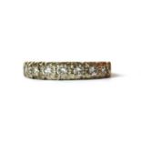 An 18ct white gold diamond half eternity ring,