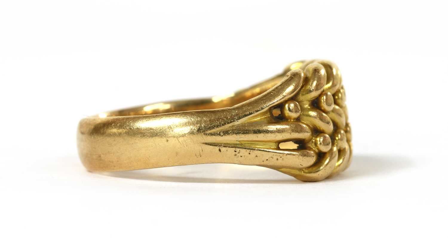 An 18ct gold keeper ring, - Image 2 of 3