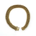 A 9ct gold hollow double curb link bracelet, by UnoAErre,