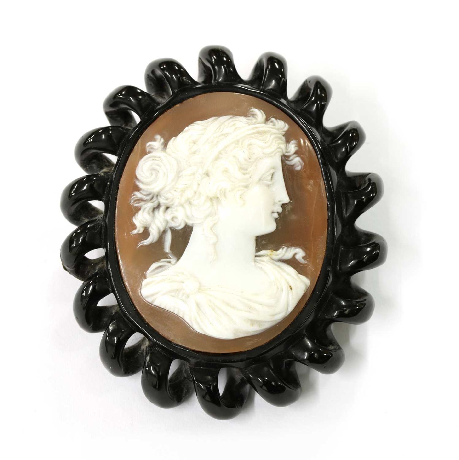 A jet cameo brooch/pendant,