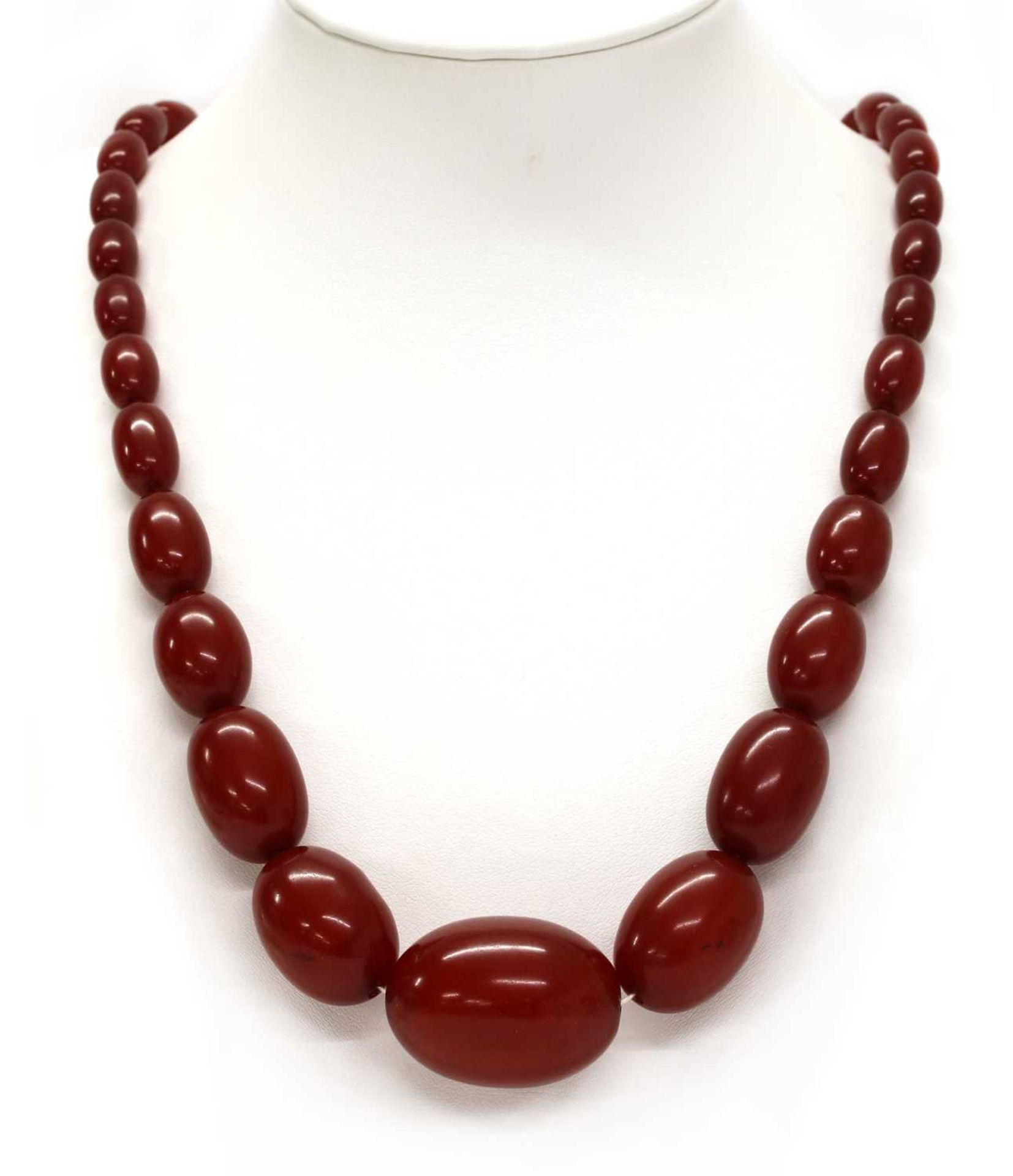 A single row graduated cherry coloured Bakelite bead necklace, - Image 2 of 4