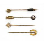 Five gold stick pins,