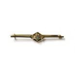 An Edwardian gold aquamarine and split pearl bar brooch,