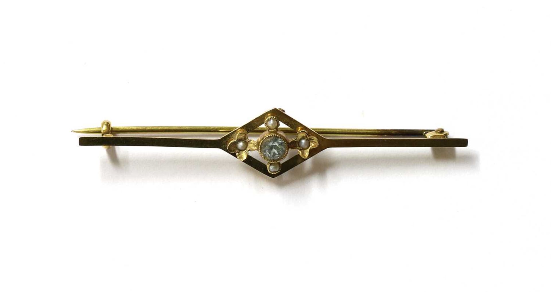 An Edwardian gold aquamarine and split pearl bar brooch,
