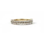 A gold baguette cut diamond ring,