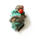 An Asian silver turquoise dragon pendant,