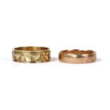 A 9ct gold patterned flat section wedding ring,