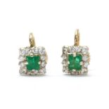 A pair of silver and gold emerald and white sapphire cluster earrings,