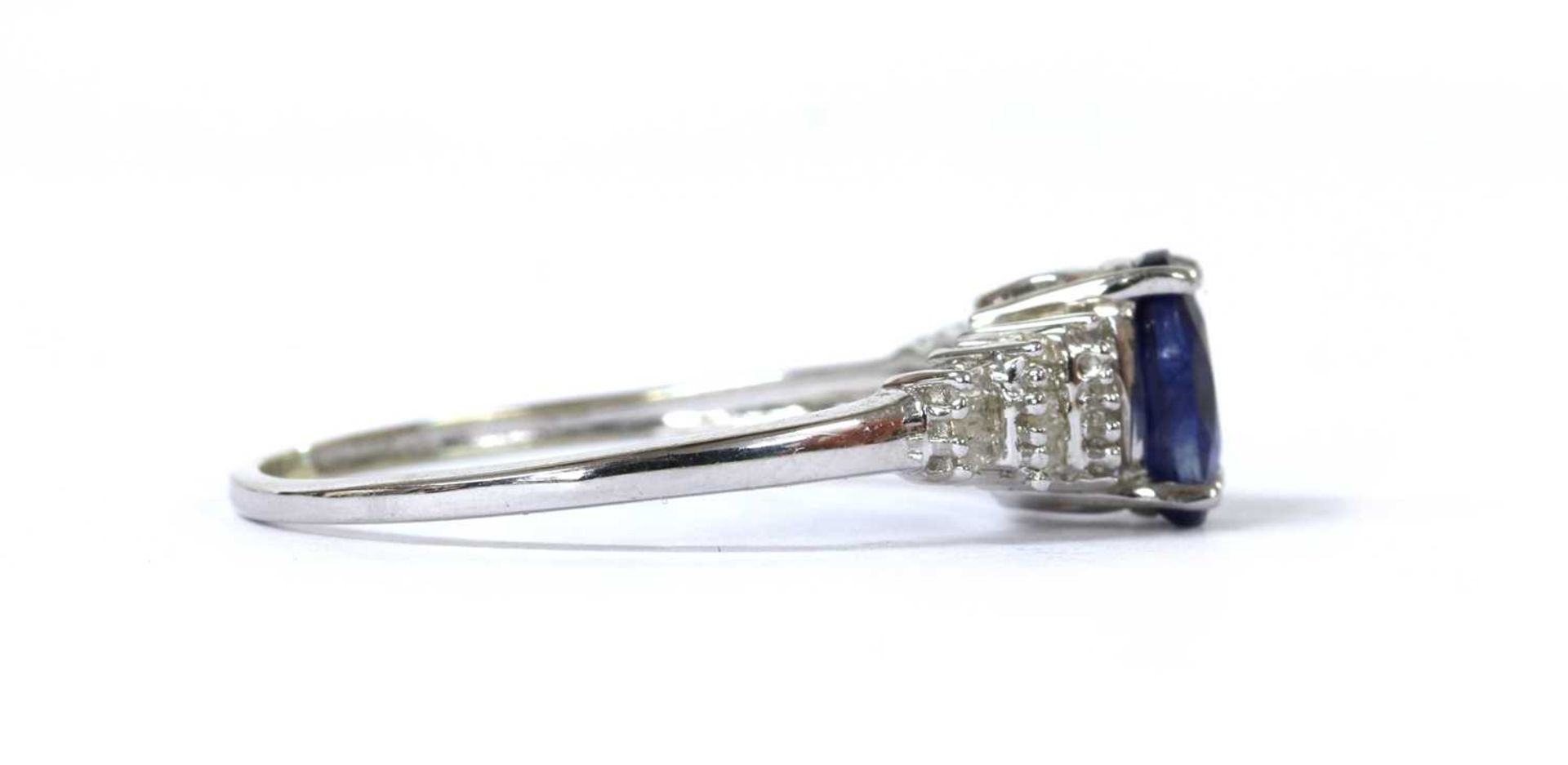 A white gold fracture filled sapphire and diamond ring, - Image 2 of 3