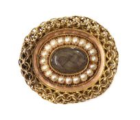 A gold split pearl oval memorial brooch, c.1810-1820,