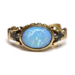 An antique style single stone opal ring,