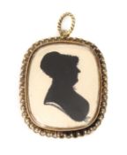 A Regency gold mounted painted silhouette pendant,