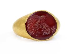 A Roman hollow gold hardstone intaglio ring,
