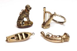 A watch key in the form of a harp,