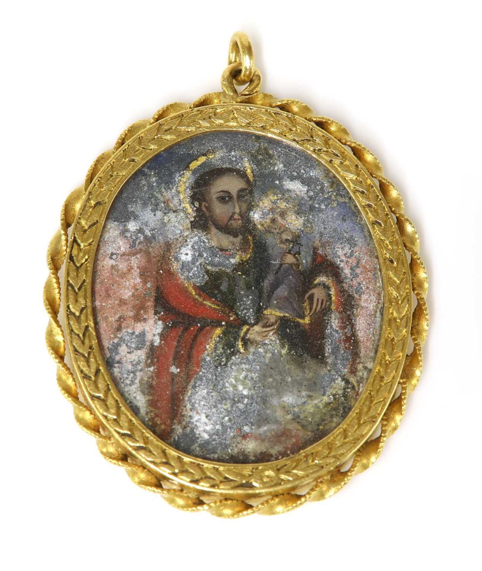 A gold South American or Spanish oval reliquary pendant,