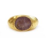 A Roman hollow gold hardstone intaglio ring,