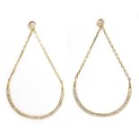 A pair of diamond set 'smile' drop earrings,