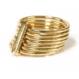 An 18ct gold seven row ring, by Gucci,