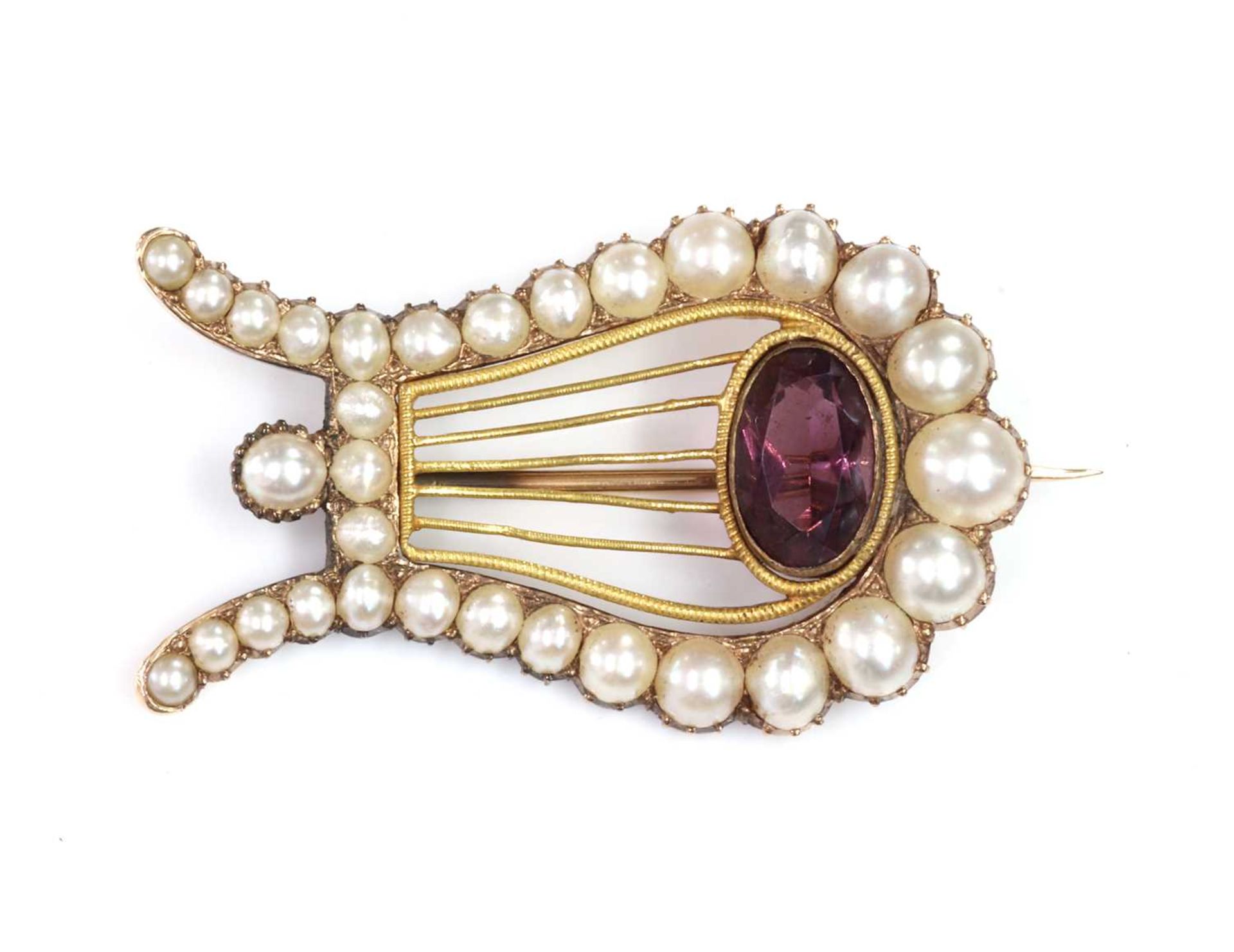 A Georgian paste and split pearl lyre brooch,