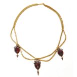 A Victorian gold cabochon garnet and diamond swag necklace, c.1850,