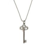 An 18ct white gold diamond set 'Crown Key' pendant, by Tiffany & Co.,