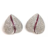 A pair of ruby and diamond heart shaped earrings,