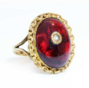 A Victorian cabochon garnet and diamond later mounted as a ring,