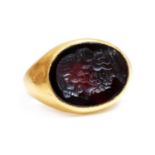 A Roman hollow gold hardstone intaglio ring,