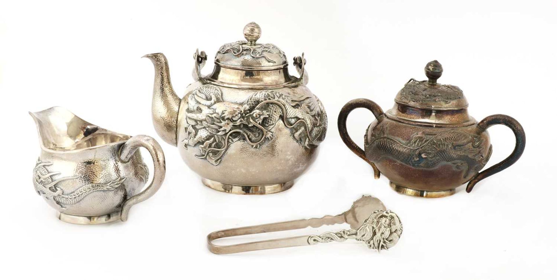 A Japanese silver three-piece tea service,