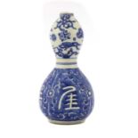 A blue and white vase,