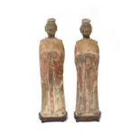 A pair of Chinese pottery figures,