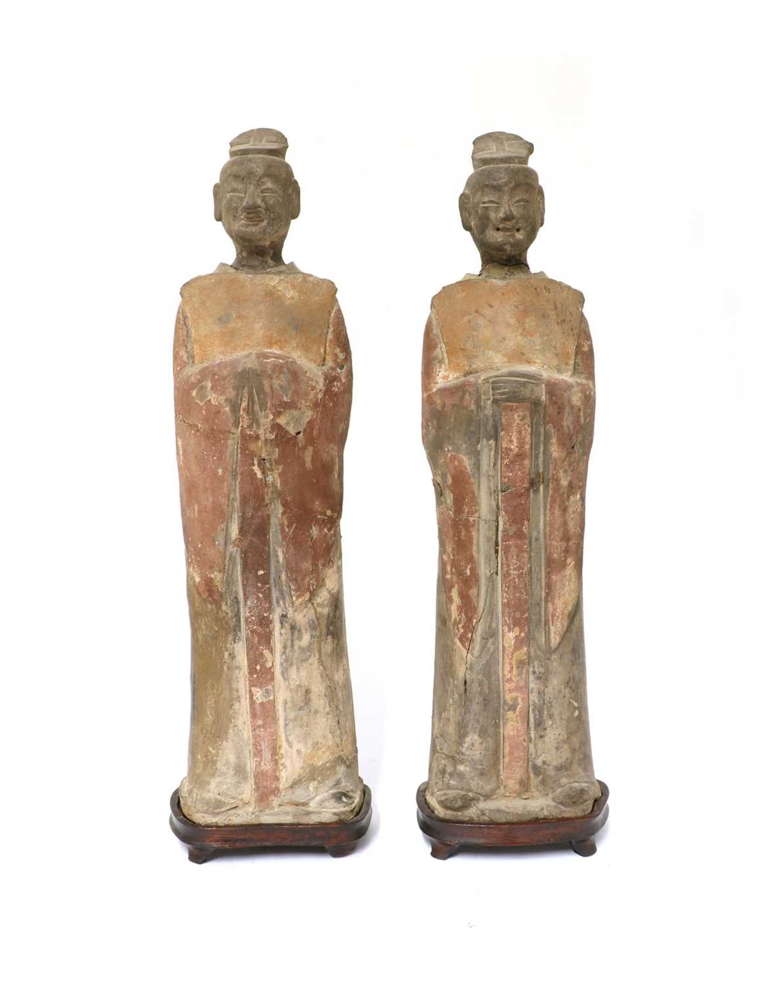 A pair of Chinese pottery figures,