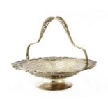 A Chinese export silver swing-handled fruit basket,