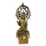 A Chinese gilt-bronze Buddha,