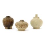 Three South Asian earthenware jarlets,