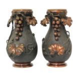 A pair of Japanese bronze vases,